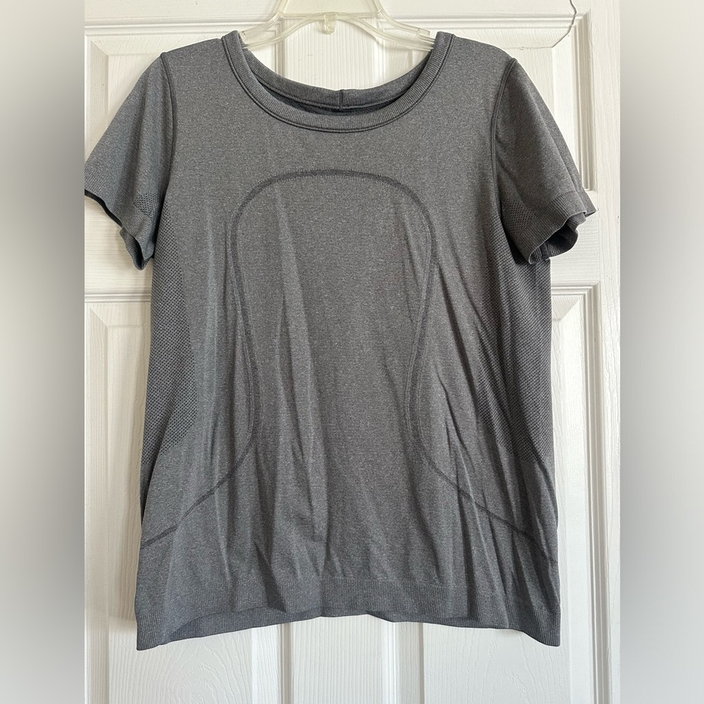 Women’s Swiftly Tech Short Sleeved Shirt. Great condition. Gray, size 10.